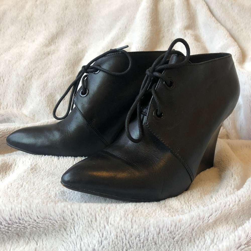Clarks black leather wedge booties